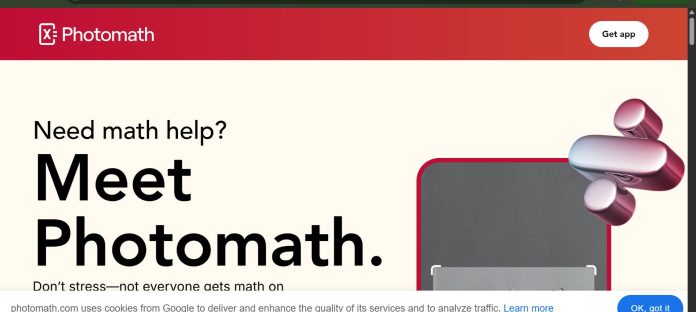 Photomath AI math solver showing step-by-step working